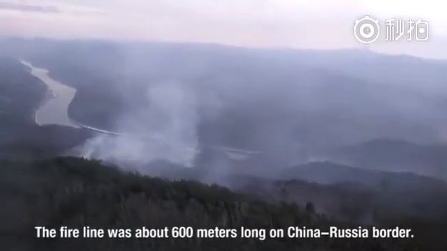 Wildfire in Russia burned into N China's forest, 1345 Chinese firefighters sent to battle the fire смотреть онлайн