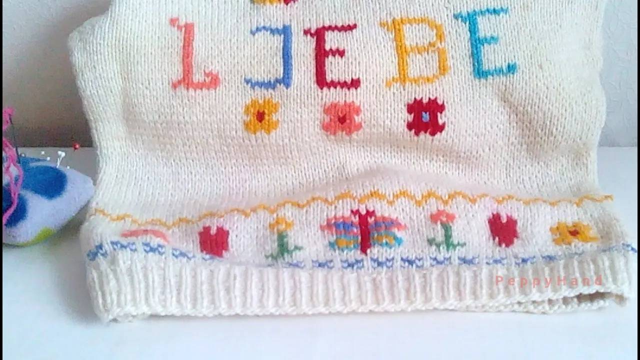 Вышиваем мотивы на вязаном изделии швом "Петля" смотреть онлайн