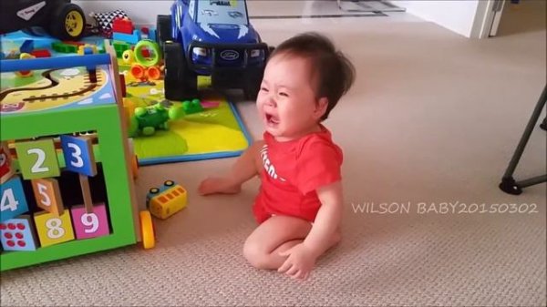 BREASTFEEDING WILSON BABY LATE AT NIGHT SITTING ON BED DAY54