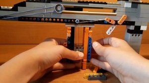 Как сделать стреляющий автомат из Лего!!!