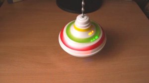 Детская игрушка музыкальная юла