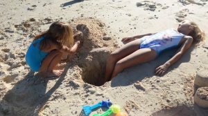 Children playing on the beach 4k
