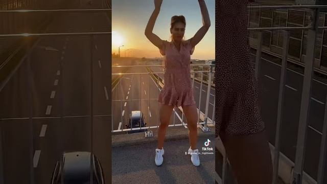 Polish girl in heels and short dress dance on the highway смотреть онлайн