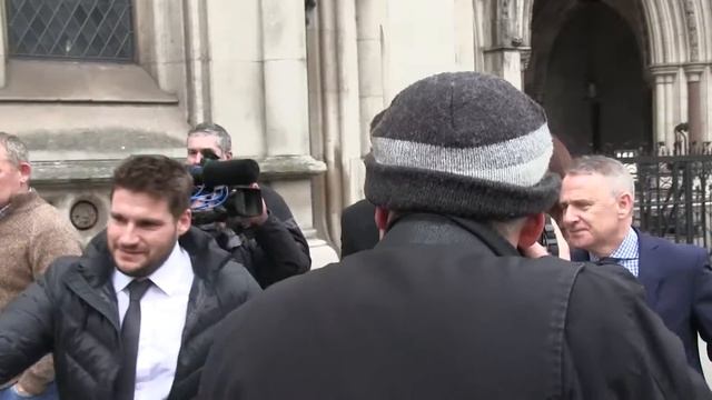 Ched Evans And Finacee Leave The Royal Courts Of Justice In London смотреть онлайн
