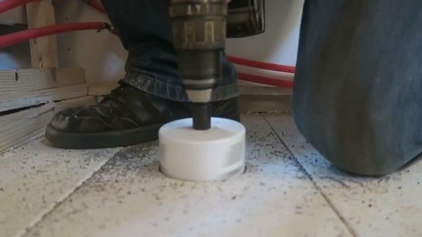 #65 SKOOLIE BUS CONVERSION | Installing a Shower Drain with a Hole Saw in our Skoolie