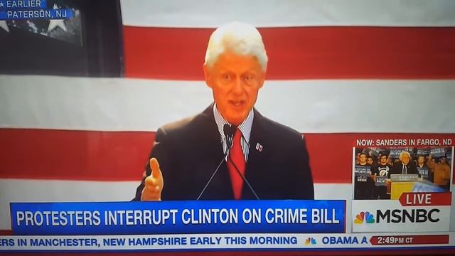 Bill Clinton in paterson,NJ get confronted by hecklers over crime bill смотреть онлайн