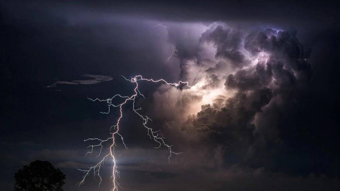Thunderstorm On A Car Roof - With Lightning Flashes.