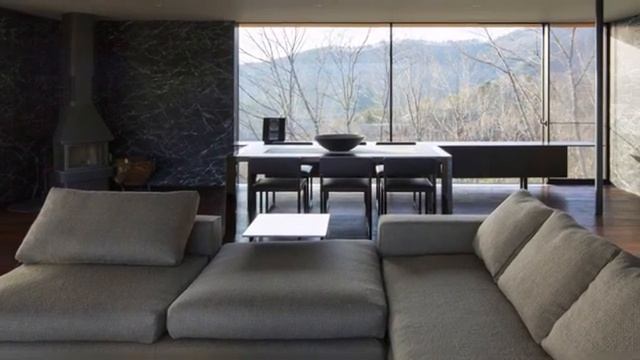 Modern And Minimalist House Located On A Sloping Mountain That Offers Spectacular Views