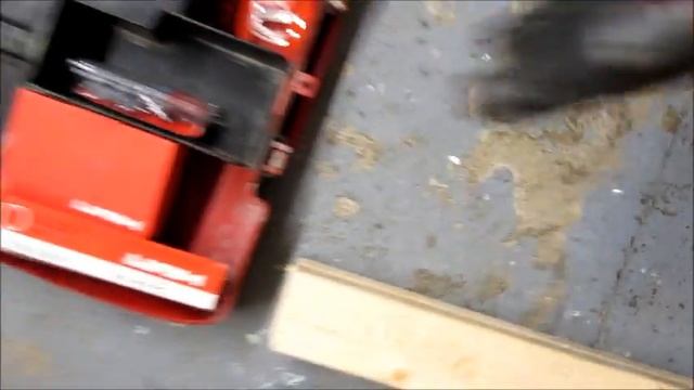 Firing a Hilti DX450 into 70mm of timber смотреть онлайн