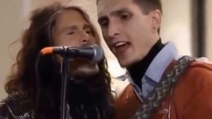 Aerosmith Steven Tyler sing with the street musician Moscow