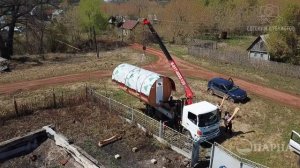 Установка готовой бани-бочки на участке