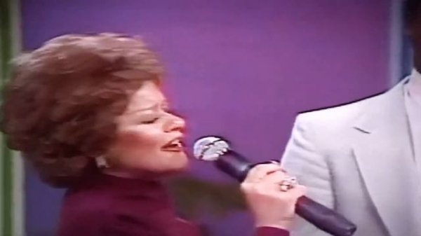 Tammy Faye Bakker Messner singing Dottie Rambo’s I Go To The Rock
