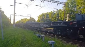 Паровоз Л-0074 с платформами следует на станцию Тихорецкая.