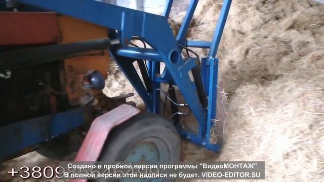 Фронтальный погрузчик КУН с вилами для сена. смотреть онлайн