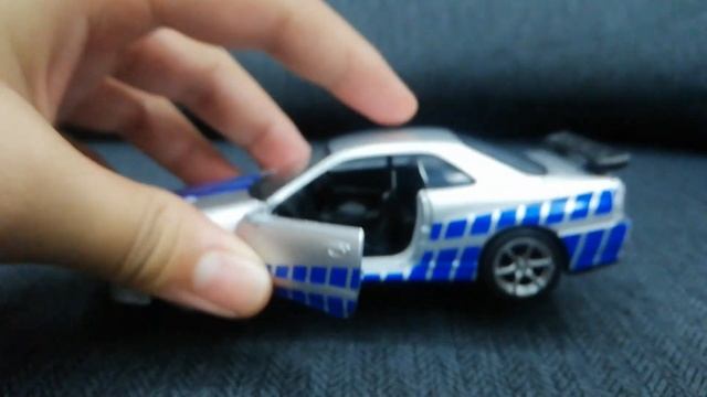Jakiekim diecast Nissan skyline r34 GTR смотреть онлайн