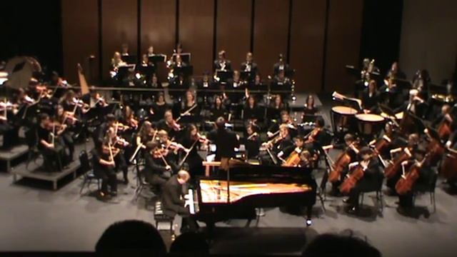 Yuri Rozum performing Rachmaninoff's Concerto No 2 in C Minor Op. 18 смотреть онлайн
