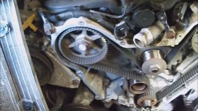 Chrysler Concorde `03 w 3.5l H.O. timing belt and water pump remove pt1 смотреть онлайн