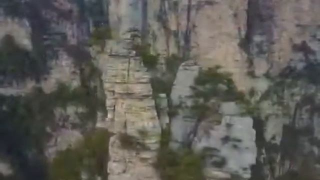 Amazing drone flight in Zhangjiajie National Park, the "Avatar Mountains" in China смотреть онлайн