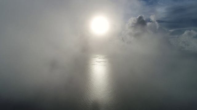 Seychelles: Flying In The Clouds Before Sunset
