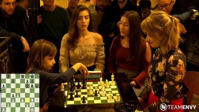 A little girl challenges a grandmaster at a chess bar in Paris смотреть онлайн