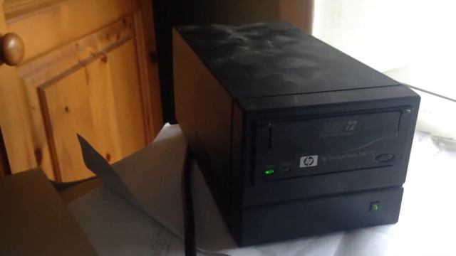 Putting a tape in a tape backup thing смотреть онлайн