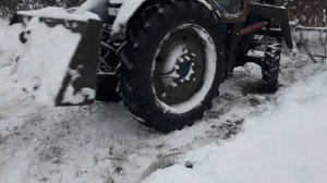 т-40АМ с кунам чистит снег.