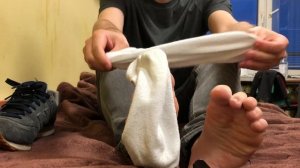Twink boy feet after 12 hours of wearing socks