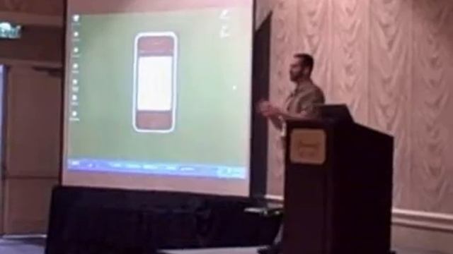 Chuck receiving a call on stage on his Ribbit AIR iPhone app смотреть онлайн