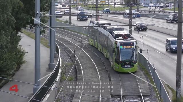 Трамвай Чижик. Трасса около ж./д. моста. Петербург. Футаж