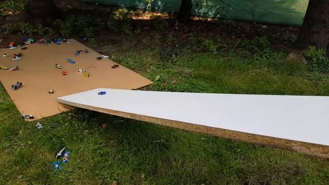 Hot Wheels Cars Slide Down The Board