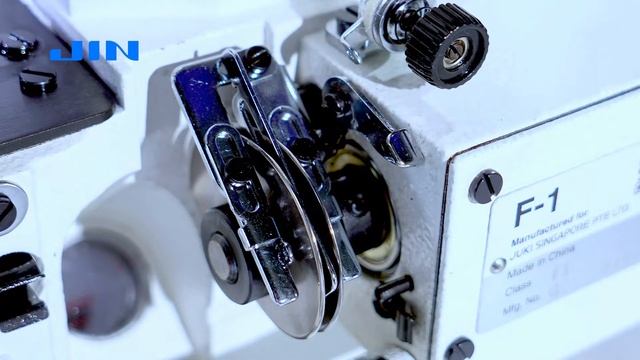 JIN F-1C- 3-х игольная, 5-и ниточная распошивальная машина с цилиндрической платформой. смотреть онлайн