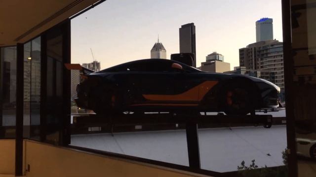 Aston Martin GT12 lifted through a 2nd story window by crane смотреть онлайн