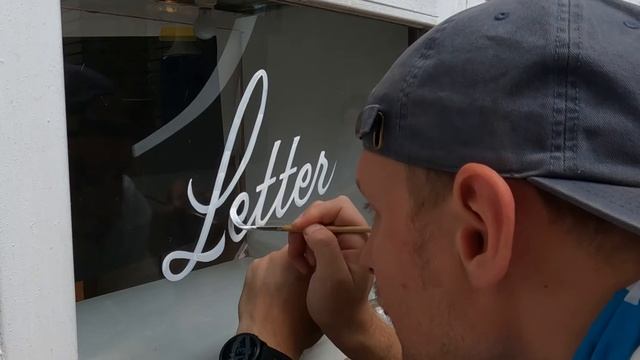 Script lettering on a window in Kyoto, Japan смотреть онлайн