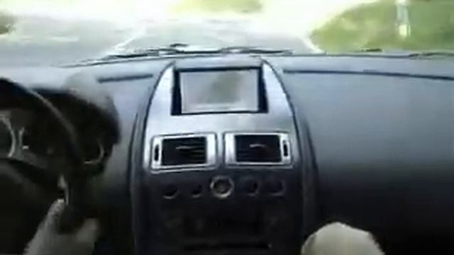 Aston Martin V8 Vantage on German country side road смотреть онлайн