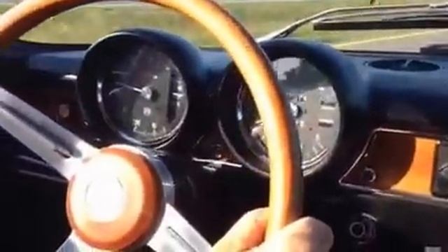 Driving Alfa Romeo 1970 1750 GTV S2 Euro onto highway смотреть онлайн