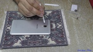 Замена стекла камеры на смартфоне.