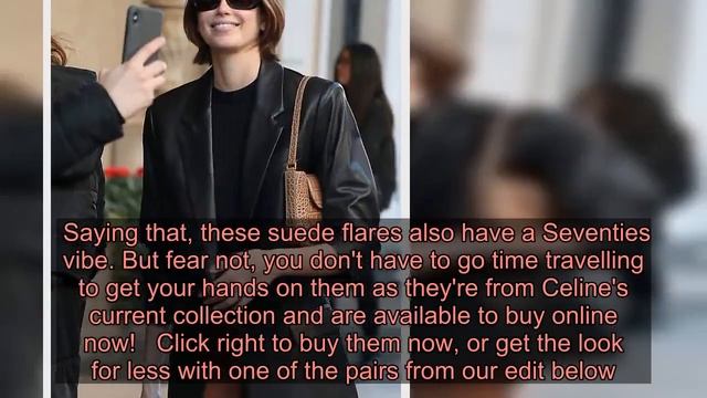 Kaia Gerber is classically chic in a leather blazer and suede flares as she takes a break from the смотреть онлайн