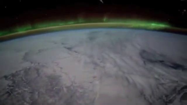 Aurora and Cold Winter Terrain Move Past the Space Station | Video смотреть онлайн
