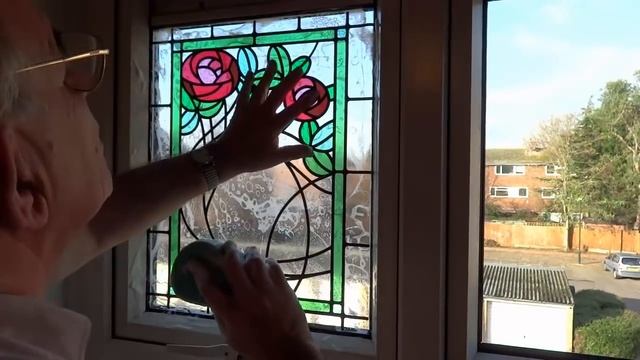 Applying Peels of London stained glass window film to your window. смотреть онлайн