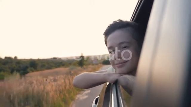 Teen Boy Looking Out the Car Window. Summer Trip with Family | Stock Footage - Videohive смотреть онлайн
