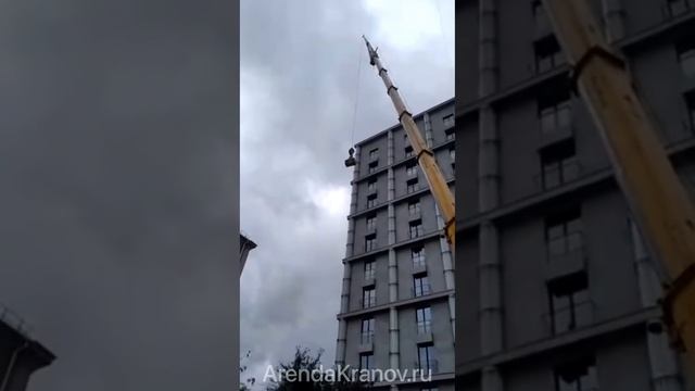 Аренда автокрана Liebherr 120 тонн с гуськом для подъема материалов на крышу в ЖК Кутузовский, 12 смотреть онлайн