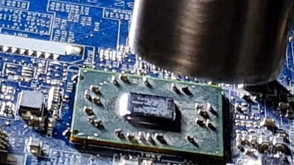 Practicing chip removal with the YiHUA 1000B Infrared BGA Rework Station Hot Air Iron.