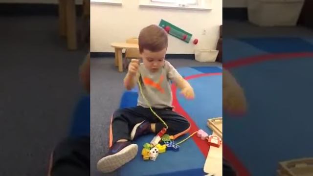 Preschool student develops fine motor skills at Apple Montessori Schools смотреть онлайн