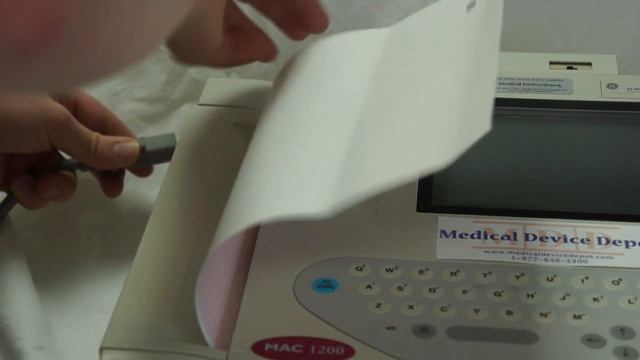 GE Marquette Mac 1200 - Loading Paper