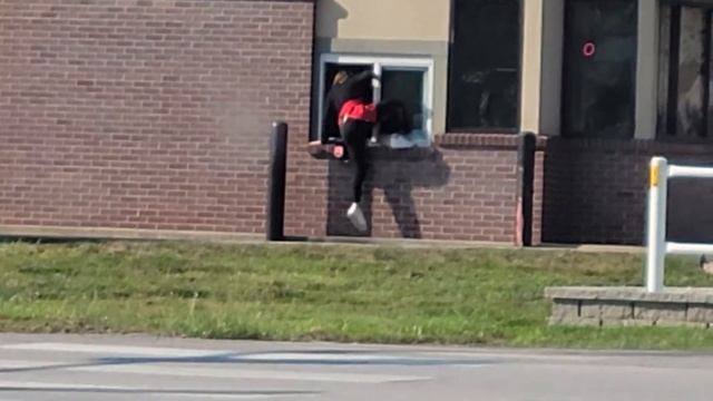 Scooters employee climbing in through drive thru window смотреть онлайн