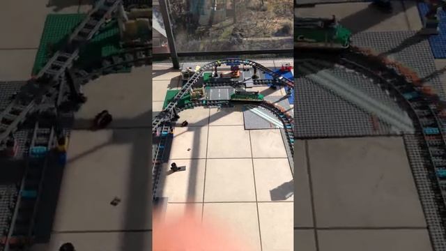 a short video lego train 60198 crossing winter balcony in sunny day смотреть онлайн