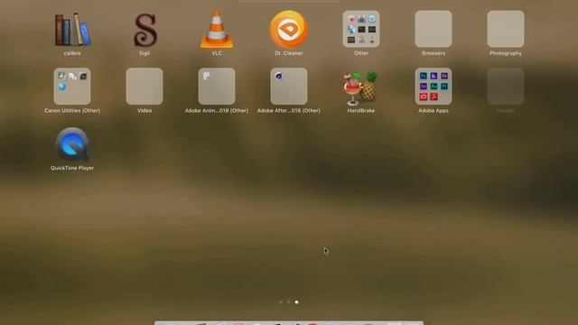 Mac OS X Tutorial - How to Remove Empty Folders From Launchpad смотреть онлайн