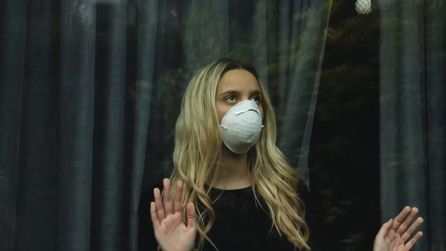 Girl With Mask Looking Through Window смотреть онлайн