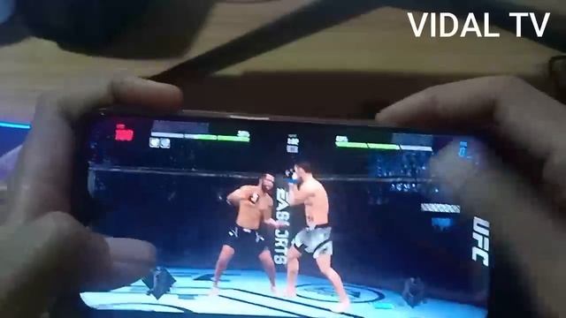 HANDCAM EA SPORTS UFC MOBILE 2 GAMEPLAY ANDROID JORGE MARSIDAL VS MELSON смотреть онлайн