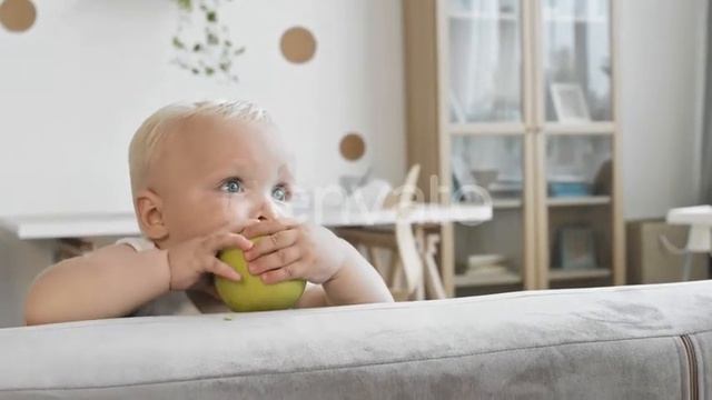 Sweet Toddler Eating Green Apple | Stock Footage - Envato elements смотреть онлайн